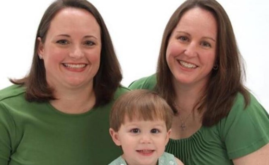 Ashley Broadway with wife Army Lt. Col. Heather Mack and son.