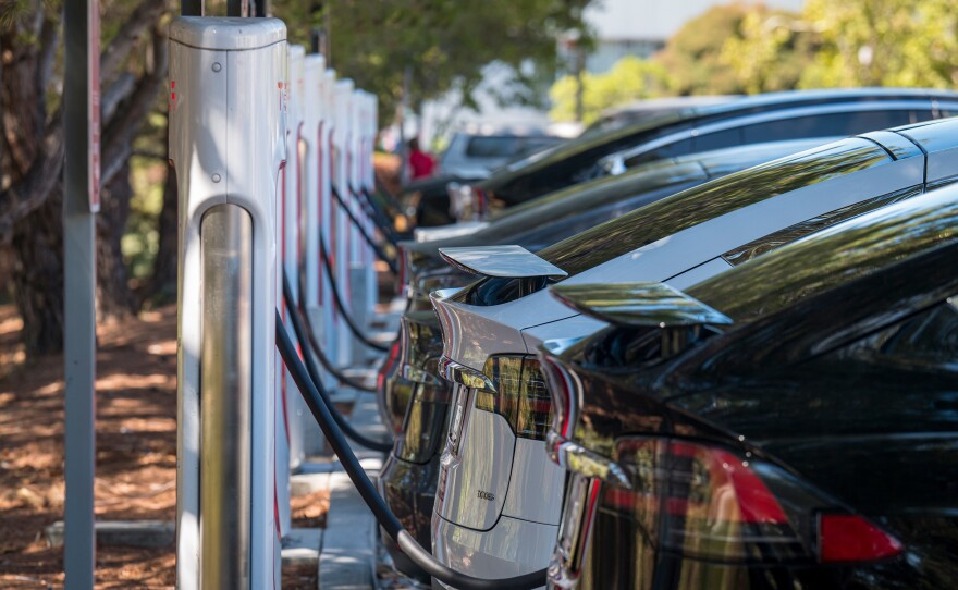 Electric vehicles at a charging station in San Mateo, Calif., last year. The governors of a dozen states, including California, have called on President Biden to order that all cars and light trucks sold in the U.S. after 2035 be zero emission vehicles.