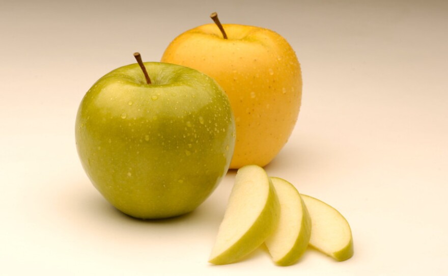 Arctic Apples are genetically engineered to produce less of the enzyme that turns sliced apples brown.
