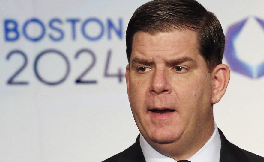 Then-Boston Mayor Martin Walsh speaks during a news conference in Boston on Jan. 9, 2015, promoting the city's bid to host the 2024 Olympic Summer Games. Walsh led the city over two terms.
