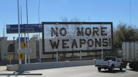 A sign in Ciudad, Juarez, Mex., made of confiscated firearms. 