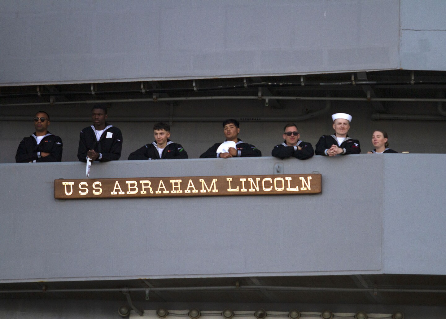 Navy sailors watch MSU and Gonzaga play on the USS Abraham Lincoln on Nov. 11, 2022 during the Armed Forces Classic - Carrier Edition. This is the first time the event has been held on an active U.S. Navy ship since 2011.