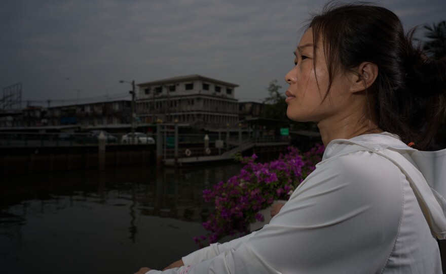 False accusations of making bomb threats and an alleged con left Liu Fengling and her two children stuck in Thailand for nearly a year. Here, she's seen in Bangkok on Jan. 29.