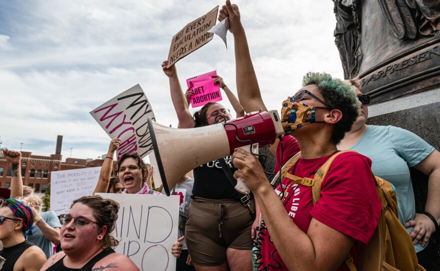 Abortion rights protesters in Louisville, Ky., after the Supreme Court announced it had voted to overturn <em>Roe v. Wade</em>. On Monday, abortion rights advocates filed a lawsuit arguing that the Kentucky state constitution protects the right to abortion.