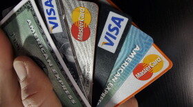 In this March 5, 2012 file photo, consumer credit cards are posed in North Andover, Mass.