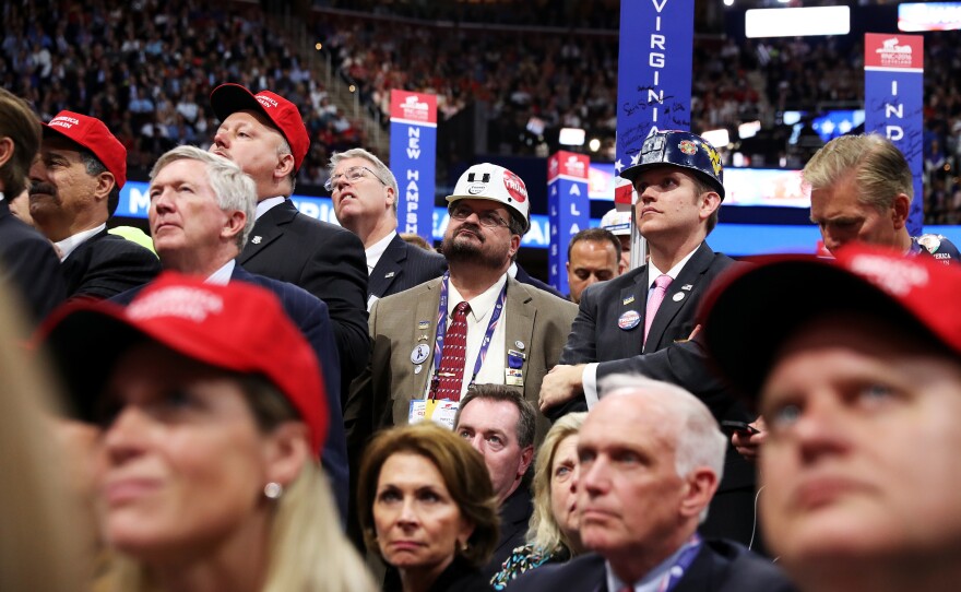 Delegates listen to Ivanka Trump's speech from the convention floor.