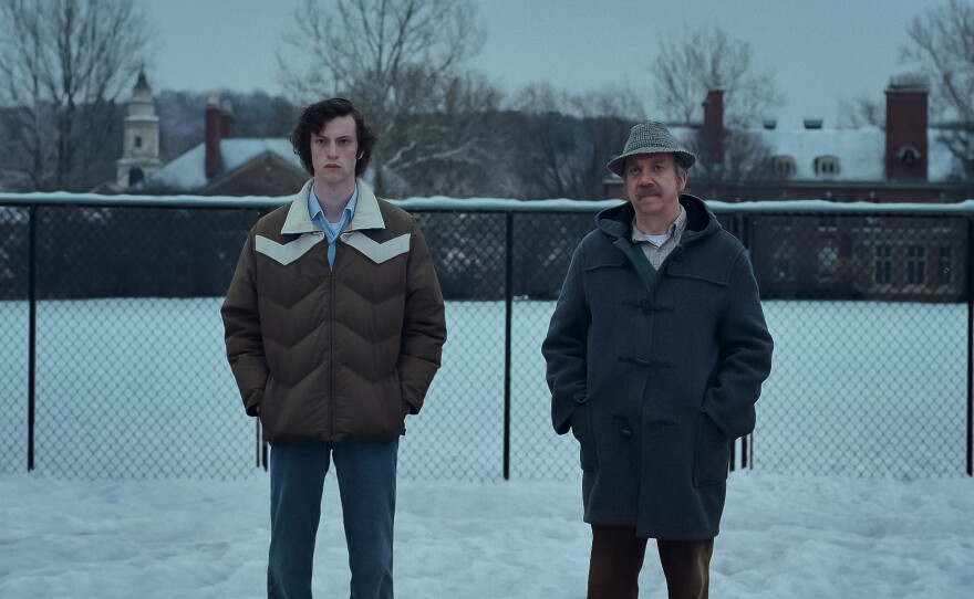 Dominic Sessa, left, and Paul Giamatti in <em>The Holdovers. </em><strong><a href="https://www.npr.org/2023/10/26/1208654864/the-holdovers-alexander-payne-paul-giamatti">Read a review.</a></strong>