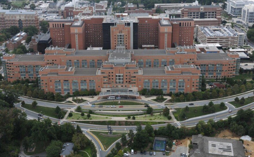 An American who contracted Ebola while volunteering in Sierra Leone was admitted to the hospital at the NIH Clinical Center in Bethesda early Friday.
