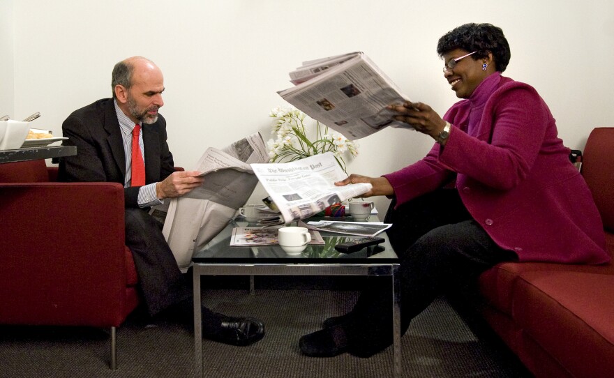 Gerald Seib (left) and Gwen Ifill go over the news before filming ABC's This Week at the Newseum in Washington, D.C., in December 2008.