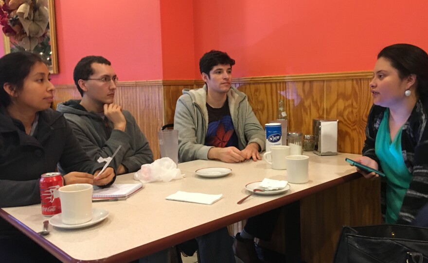 Viridiana Martinez (right) discusses immigration activism in Durham, N.C., with young people hoping to become more involved in helping immigrants in the country illegally.