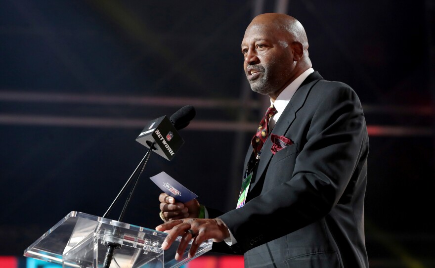 NFL Legend Monte Coleman announces a selection for the Washington Football Team during the 2nd round of the NFL football draft, Friday April 29, 2021, in Cleveland.