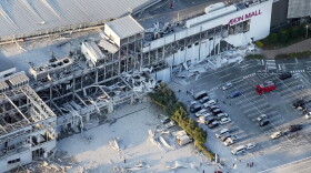 An aerial image shows the damaged AEON Mall after an earthquake in Kashima, Kumamoto prefecture, southern Japan, Tuesday.