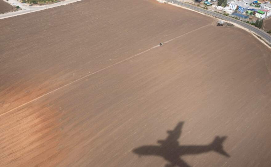 The shadow of Air Force One as seen before President Biden landed at Ben Gurion Airport in Tel Aviv on Oct. 18, 2023.