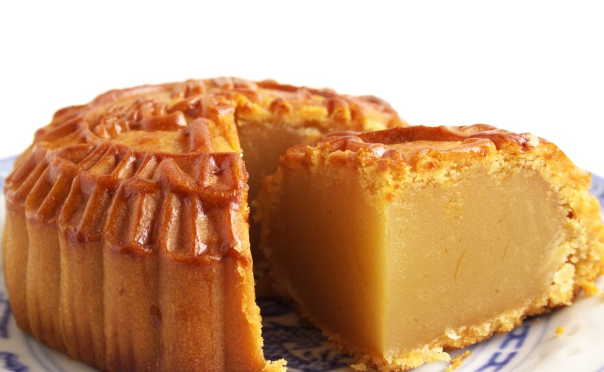 Don't let this close-up confuse you; mooncakes are actually the size and heft of a hockey puck.