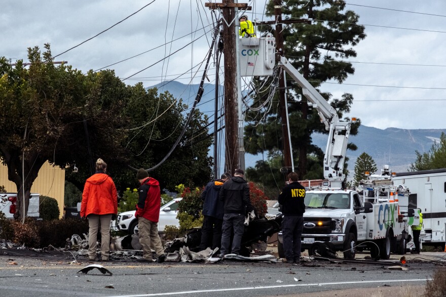 Investigators from the National Transportation Safety Board are on the scene of an airplane crash at the 1200 block of Pepper Drive in El Cajon, December 29, 2021.