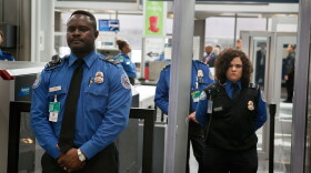 Transportation Security Administration officers staff a checkpoint at O'Hare International Airport in Chicago, Ill., in this 2010 file photo. The agency was created after the Sept. 11, 2001, attacks — but not every U.S. airport uses federal screeners.