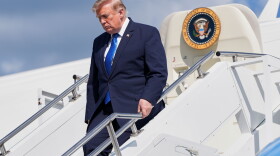 President Donald Trump exits Air Force One at Morristown Municipal Airport in Morristown, N.J., Friday, July 31, 2026, after a trip to Camp David, the presidential retreat.