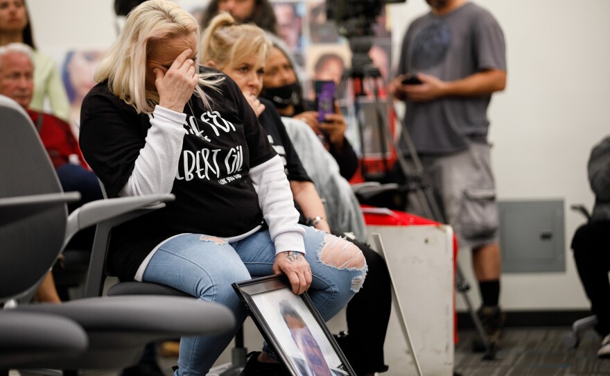 Jennifer Schmidt reacts during a listening session hosted by the In-Custody Death Review Division with the Board of State and Community Corrections in Escondido on Dec. 14, 2024. Schmidt’s father, Gilbert Gil, died in Vista jail in 2022.