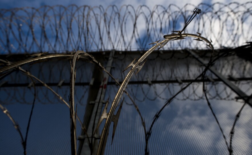 Stretches of secondary fencing are topped with spirals of concertina wire along the U.S.-Mexico border near the San Ysidro Port of Entry in San Diego on Aug. 16, 2017. 