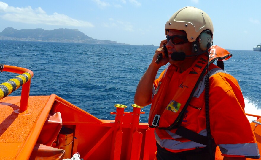 Carlos Blanco, a Spanish maritime medic, takes part in a rescue operation Wednesday for migrants in a rubber boat that was sinking. The Mediterranean is just nine miles wide between the southern tip of Spain and the northern tip of Morocco.