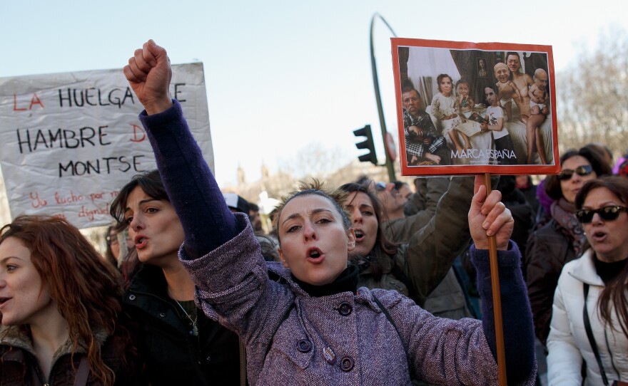 Supporters of abortion rights take part in a rally in Madrid on Feb. 1. Supporters and opponents of abortion have been holding dueling rallies this year in Spain as the government proposed strict anti-abortion legislation. But the measure has now been dropped.