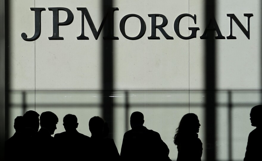 U.S. officials say JPMorgan Chase has been cooperating with American investigators looking into the bank's hiring practices in Asia.