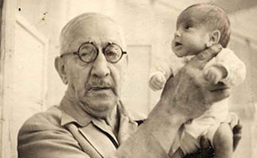Dr. Martin Couney holds Beth Allen, one of his incubator babies, at Luna Park in Coney Island. This photo was taken in 1941.
