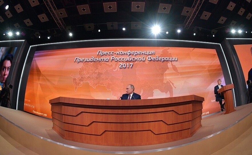 Russian President Vladimir Putin is seen at his annual news conference, in an image released by the Kremlin.