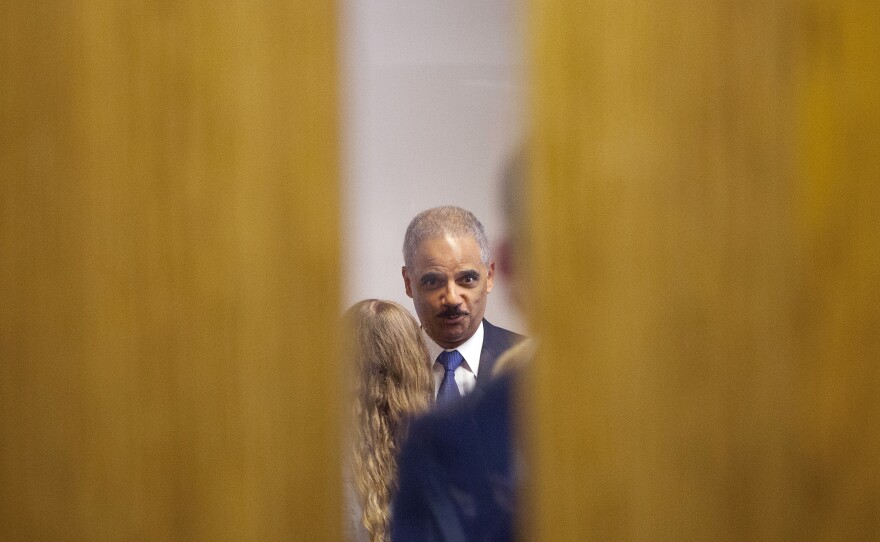 Attorney General Eric Holder participates in a closed-door meeting Wednesday with students at St. Louis Community College, Florissant Valley.