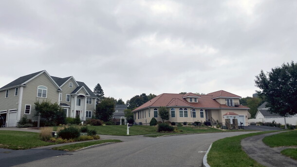 In North Braintree, Mass., larger lot sizes imposed decades ago have meant fewer homes, and bigger more expensive ones. Voters will decide whether to force cities to allow smaller homes on smaller lots.