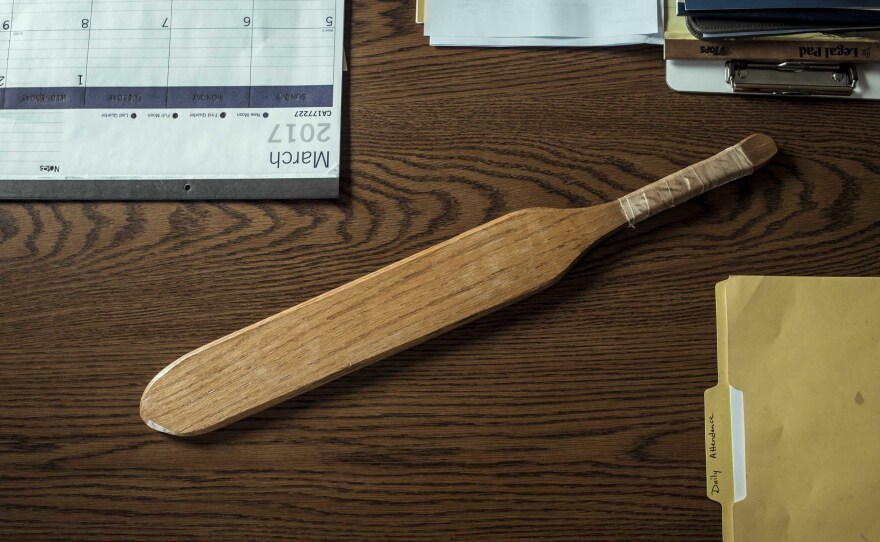 The school paddle is seen in principal David Matheson's office at Robbinsville High School, one of just a few schools in the state that still use corporal punishment.