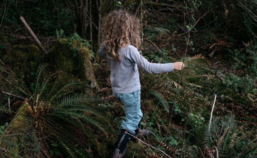 Sophie plays in her backyard in Bellingham, Wash. Her mother says she started objecting to being identified as a boy around age 2.