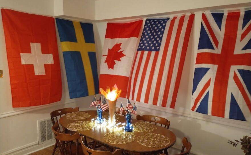 Tom Czech and Elizabeth Novak hosted an Olympics-themed party during the Tokyo games. The decor included the Olympics rings, country flags and the Olympics torch.