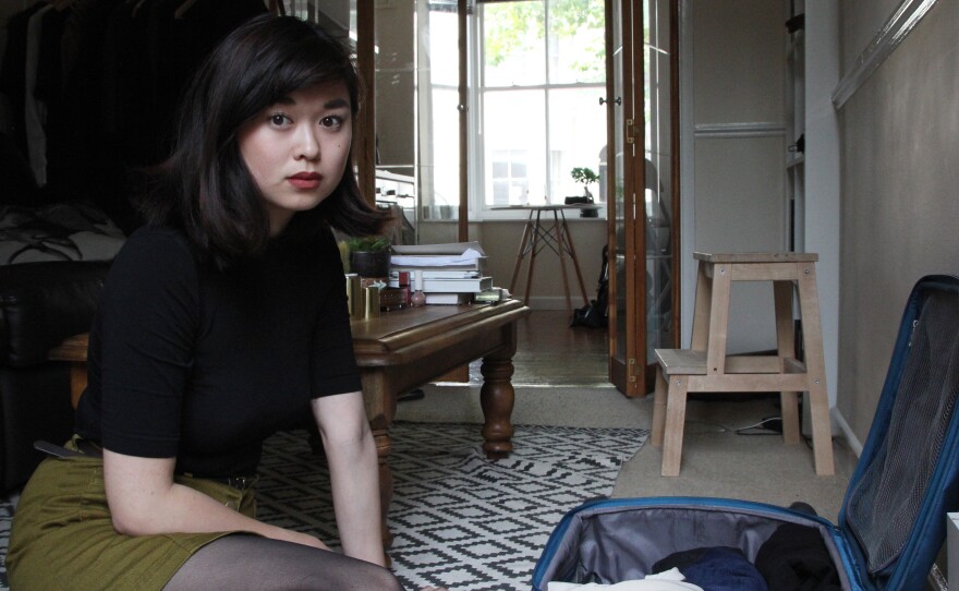 Angela Gui packs for a trip to Geneva for human rights training at the United Nations.