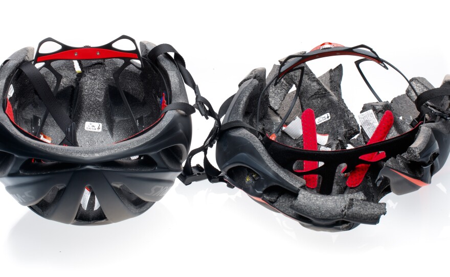 After impact, the authentic Specialized Evade helmet on the left held up but the counterfeit on the right crumbled. Specialized says the fakes lack reinforced roll cages — internal skeletons that hold the helmets together even after a crash.
