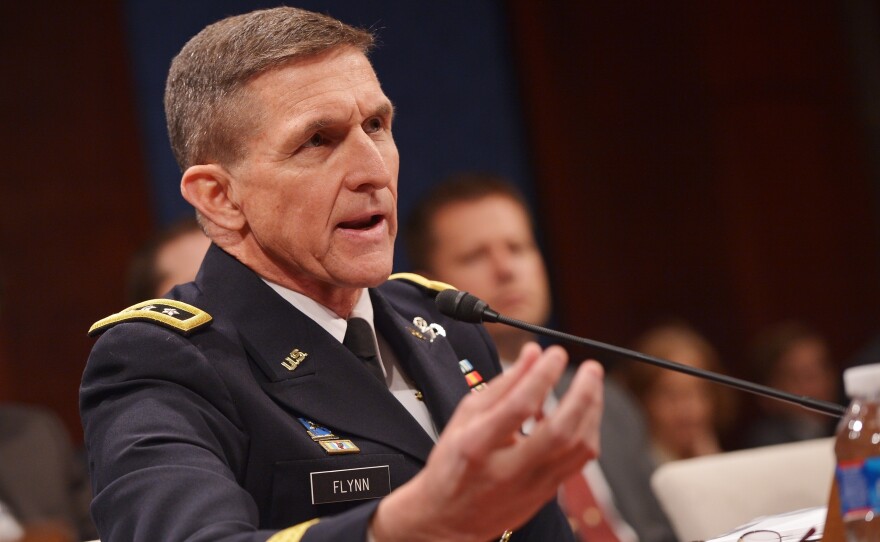 Then-Defense Intelligence Agency Director Lt. Gen. Michael Flynn testifies before the House Select Intelligence Committee in February 2014. He was forced out of that role later that year.