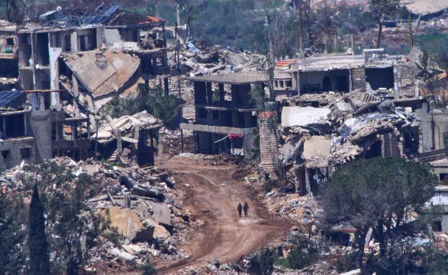 Two Israeli soldiers operate in southern Lebanon, as seen from northern Israel, April 29, 2026
