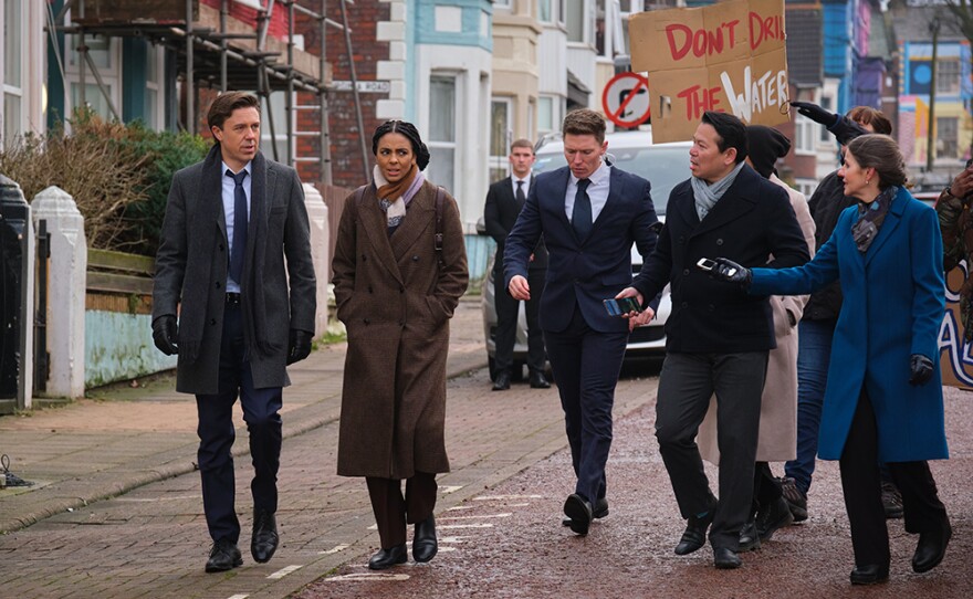 Chris (Andrew Buchan) and Francine (Marsha Thomason) tour the damage and meet protestors in Kent.