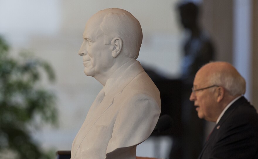 The bust of former Vice President Dick Cheney seen in the foreground ahead of Vice President Cheney in the U.S. Capitol Thursday.