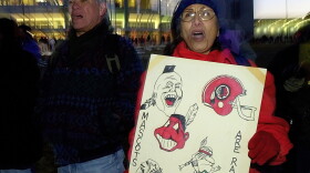 Wisconsin's new law, the first of its kind in the United States, follows years of anger and debate about sports teams' use of Native American mascots and logos. In 2002, Jan Saiz and Hugh Danforth protested at the Kohl Center in Madison.