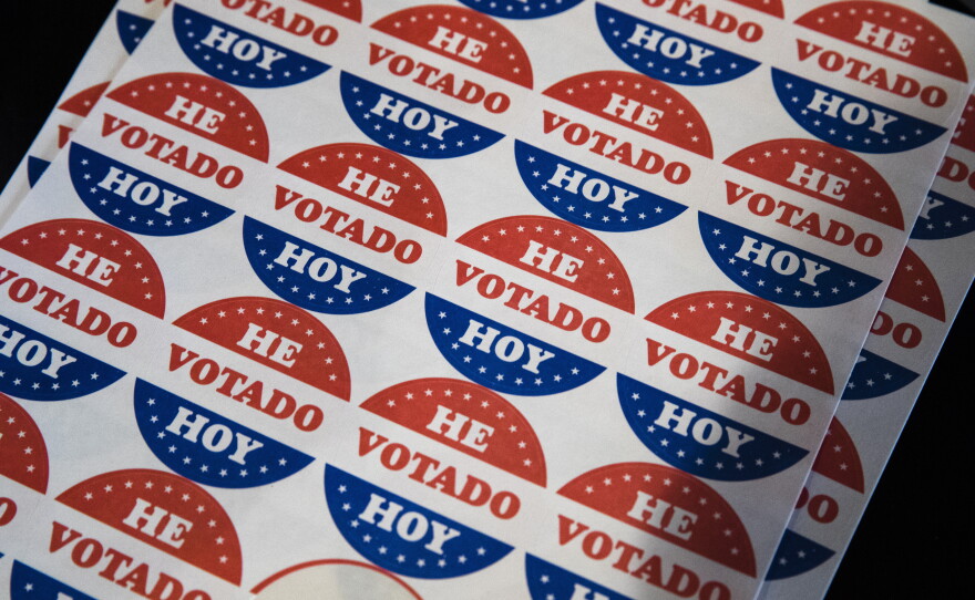Democrats are trying to rebuild trust among Latino voters, and turning to content creators for help. Above, Spanish language voting stickers which read "He Votado Hoy" ("I Voted Today") at a Philadelphia polling place in 2019.