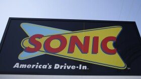 This file photo shows a sign for a Sonic Drive-In.