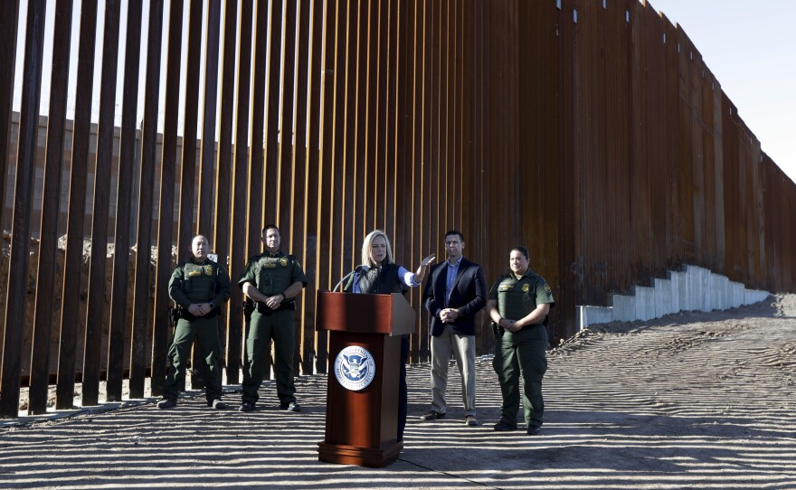 U.S. Department of Homeland Security Secretary Kirstjen Nielsen speaks in front of a newly fortified border wall structure in Calexico, Calif. in October. A federal court ruled Monday that DHS has broad authority to waive environmental regulations in the name of border security.
