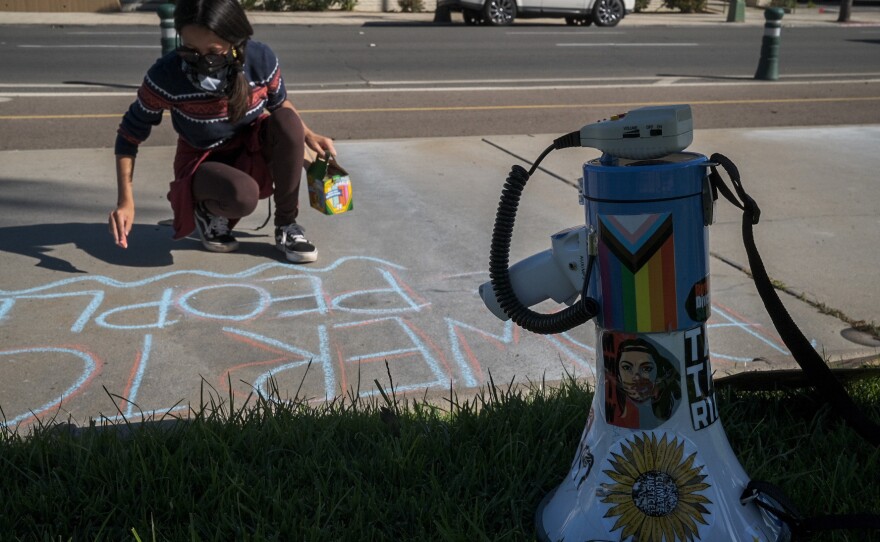 We The People, Escondido protesters gather outside of Escondido City Hall asking for the bodycam footage of the officer involved in a fatal shooting. April 28, 2021.