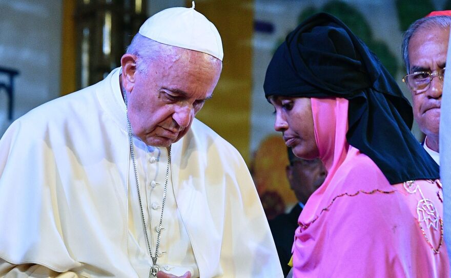 Pope Francis meets with a Rohingya refugee at the archbishop's residence in Dhaka. Pope Francis arrived in Bangladesh from Myanmar, the second stage of a visit that has been dominated by the plight of hundreds of thousands of Rohingya refugees.