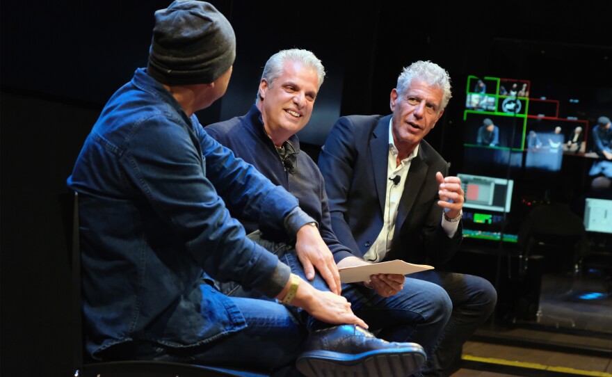 Chefs Masa Takayama (left), Eric Ripert and Anthony Bourdain chat during a screening of Anthony Bourdain: Parts Unknown in 2016 in New York City.