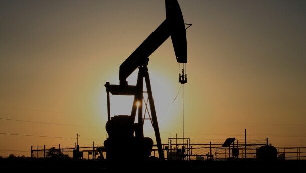 A pump jack operates at sunset in the Permian Basin near Loving, N.M., on Tuesday, May 20, 2025.