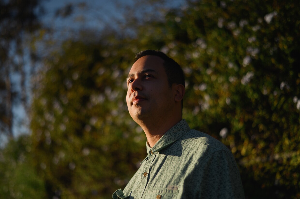 GIS researcher Jacob Helfman stands for a portrait near his family's home in West Chula Vista on Dec. 14, 2023. Helfman recently analyzed public data on the city's parks and neighborhoods to show