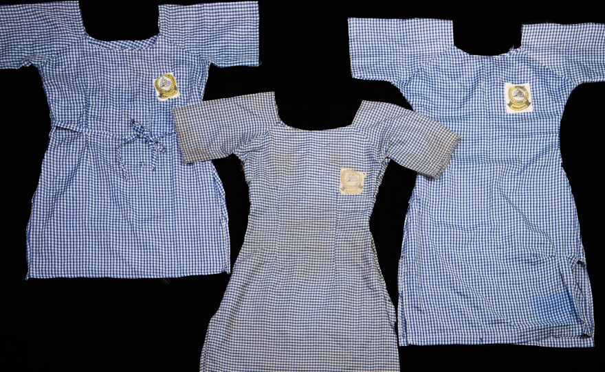 Photographer Glenna Gordon has documented what the Chibok girls left behind, including their school uniforms. One was likely made in a hurry, with messy stitching and different color threads. Another one was well-made but utilitarian – probably stitched by the girl's mother. Another dress was dirty and threadbare.