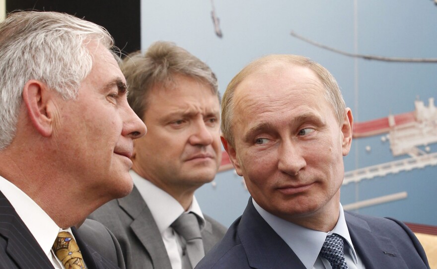 Russian President Vladimir Putin (right) and ExxonMobil CEO Rex Tillerson (left) attend a signing ceremony of an agreement between state-controlled Russian oil company Rosneft and ExxonMobil in 2012 at the Black Sea port of Tuapse, southern Russia.